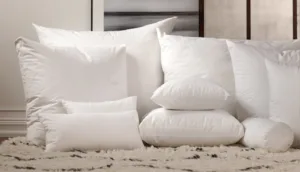 decorative pillows stacked next to each other
